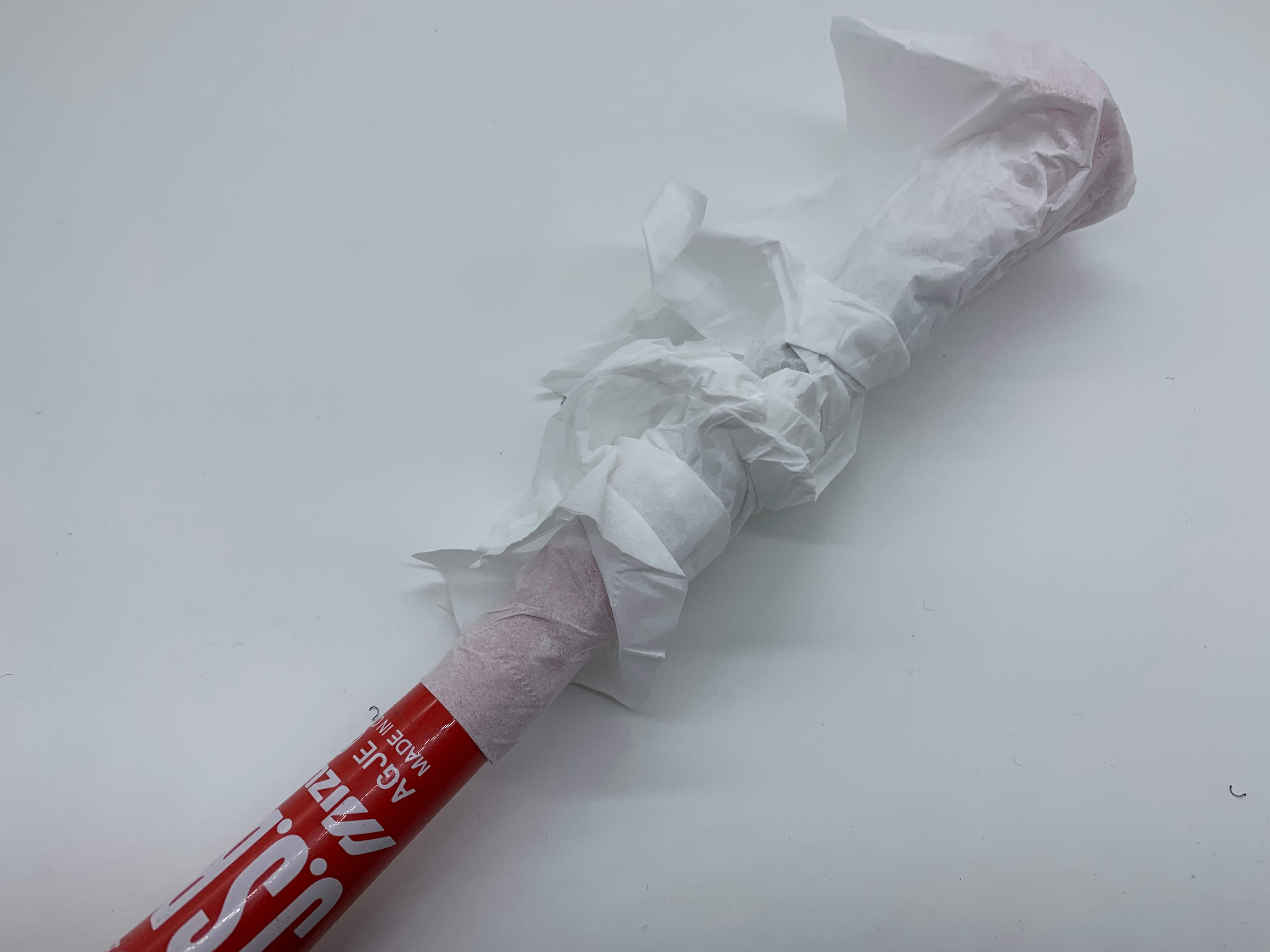ティッシュで巻いたバットグリップエンド